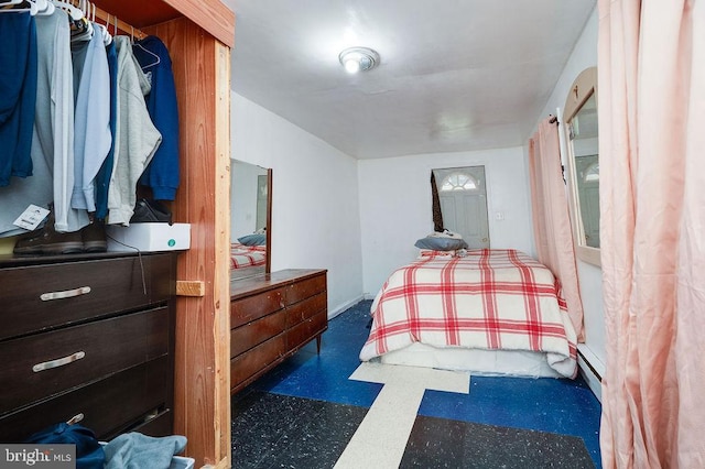 bedroom featuring a baseboard radiator