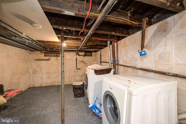 washroom with washing machine and dryer