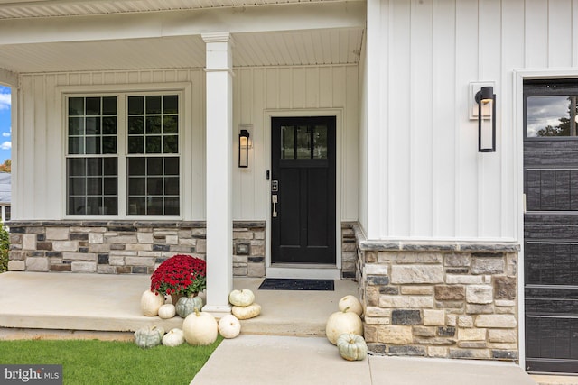 doorway to property with a porch