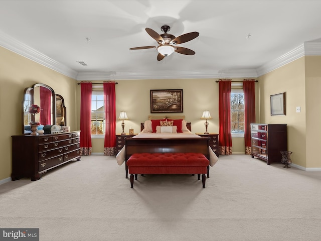 carpeted bedroom with multiple windows, crown molding, and ceiling fan