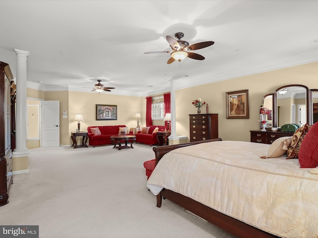 bedroom featuring crown molding, ceiling fan, carpet, and ornate columns