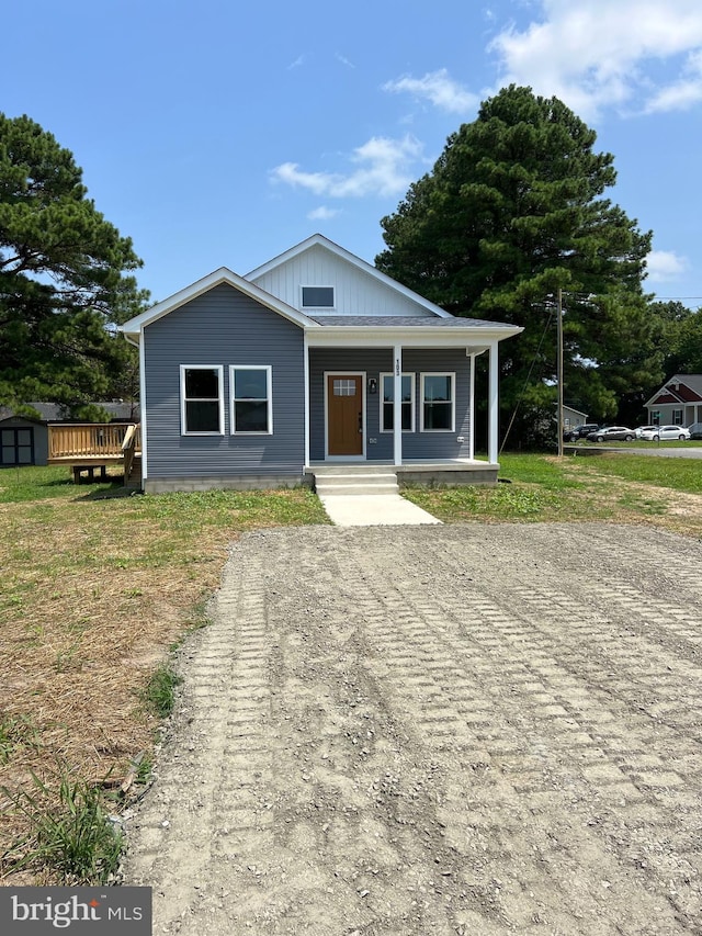 bungalow-style home with a porch