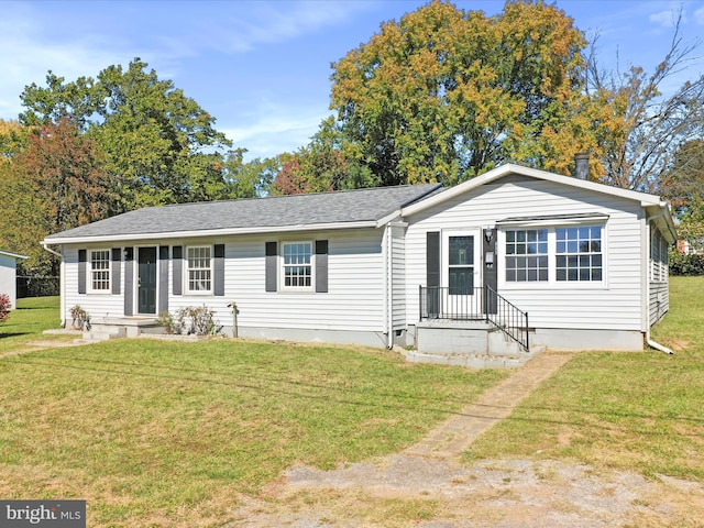 single story home with a front lawn