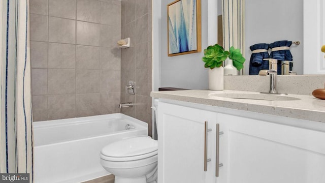 full bathroom featuring vanity, toilet, and shower / bathtub combination with curtain