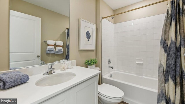 full bathroom featuring vanity, toilet, and shower / tub combo