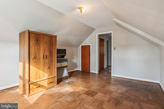 additional living space with lofted ceiling