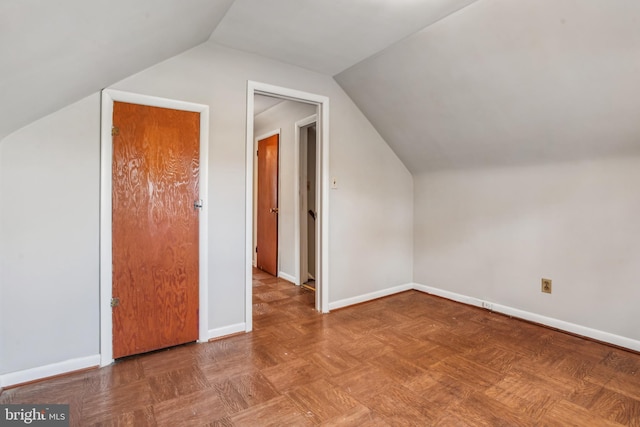 additional living space with lofted ceiling and parquet flooring