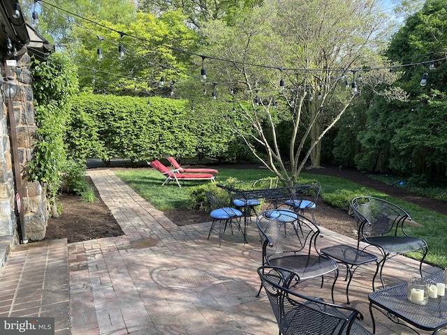 view of patio featuring outdoor dining space