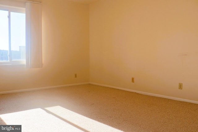 view of carpeted spare room