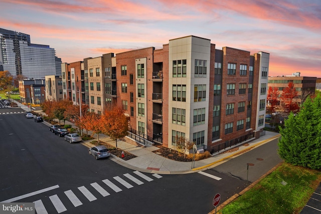 view of outdoor building at dusk