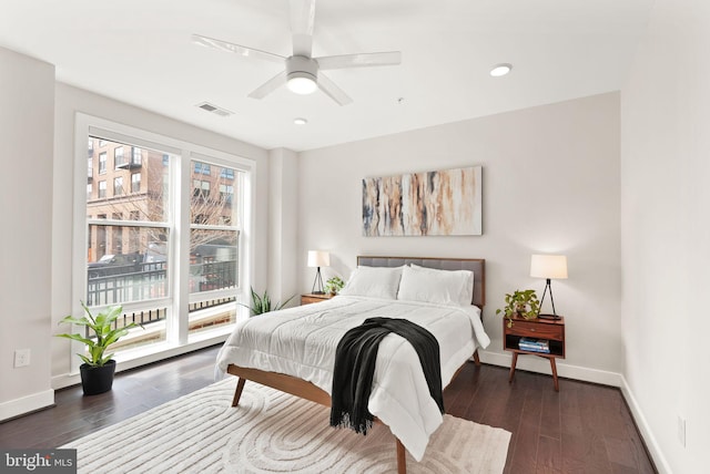 bedroom featuring dark hardwood / wood-style flooring