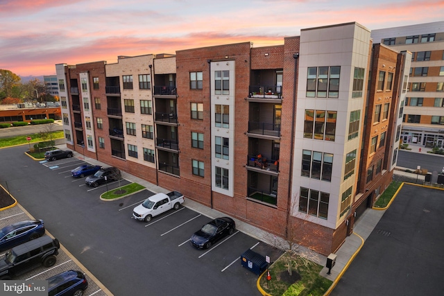 view of outdoor building at dusk