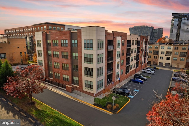 view of outdoor building at dusk