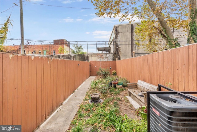 view of yard featuring central AC