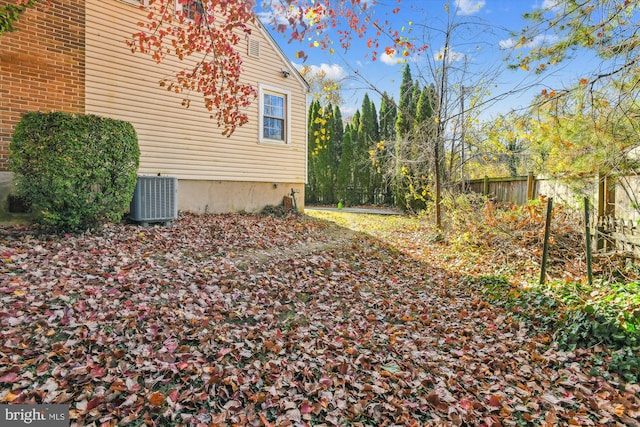 view of yard featuring central AC