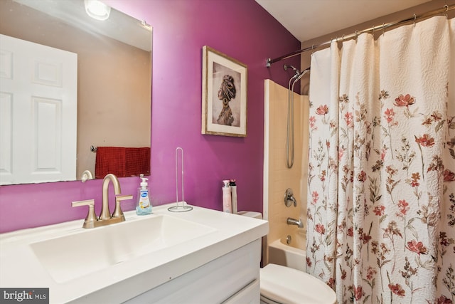 full bathroom featuring vanity, shower / tub combo with curtain, and toilet