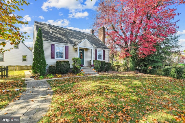 view of front of home with a front yard