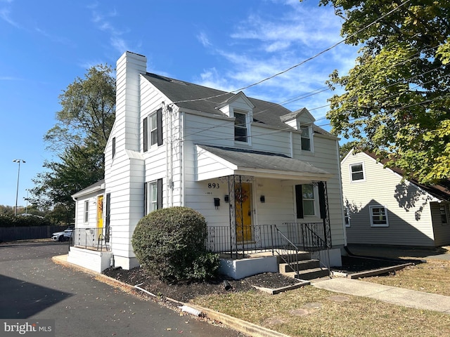 893 Parkway Ave, Ewing, NJ 08618 - view of front of property with a chimney