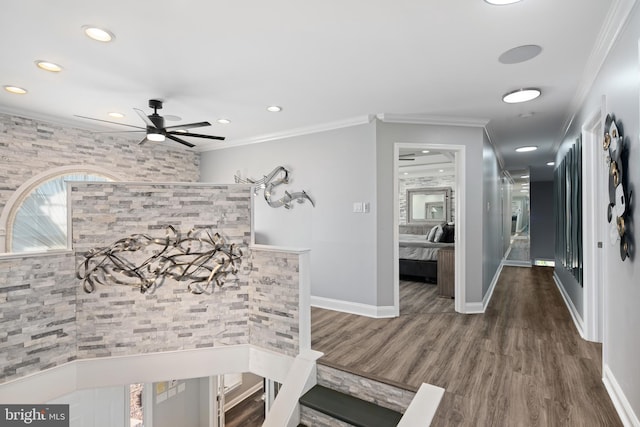 interior space featuring ornamental molding and dark hardwood / wood-style flooring