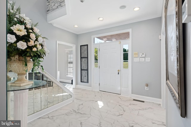 entrance foyer with crown molding