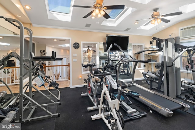 gym featuring lofted ceiling, crown molding, and ceiling fan