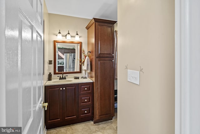 bathroom featuring vanity and tile patterned flooring