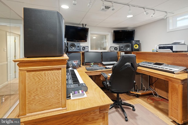 office space with light wood-type flooring