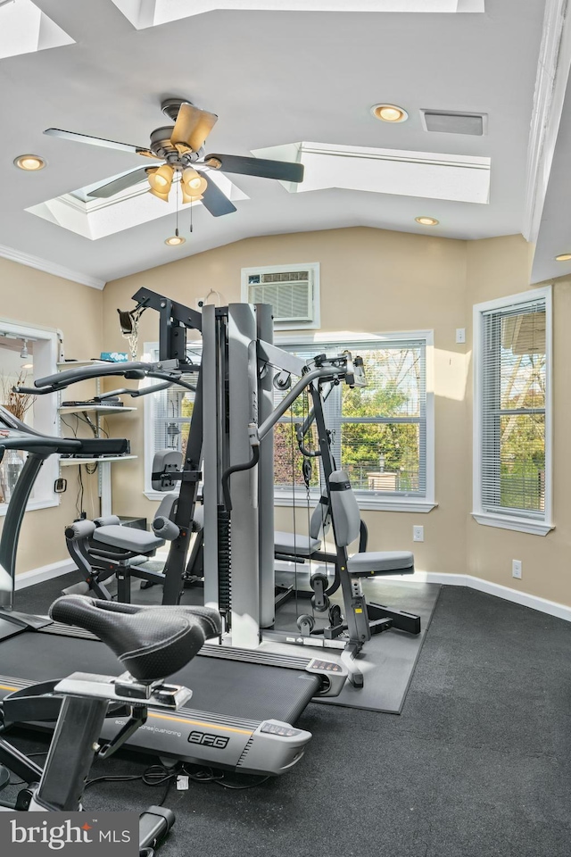 workout area featuring ornamental molding, a healthy amount of sunlight, ceiling fan, and a wall mounted air conditioner