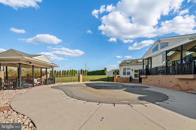 view of pool with a deck and a patio area