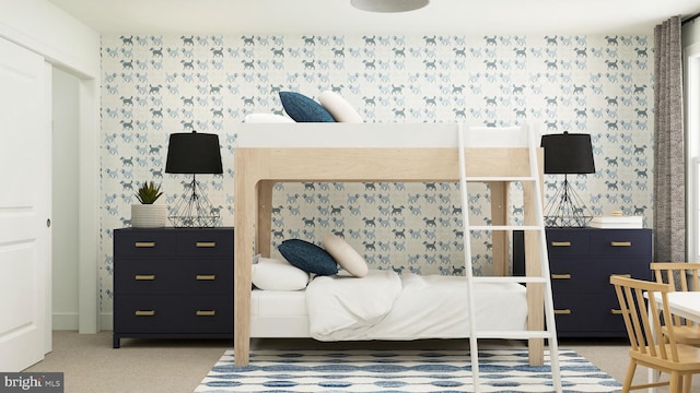 bedroom with wallpapered walls