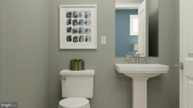 bathroom featuring toilet