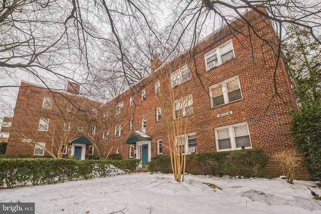 view of snow covered building