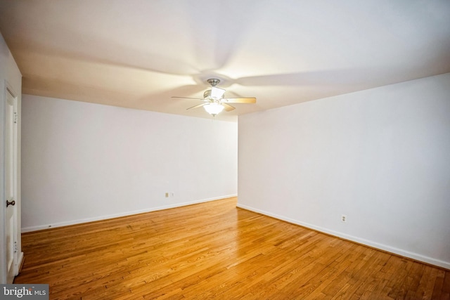 unfurnished room with ceiling fan and light hardwood / wood-style floors