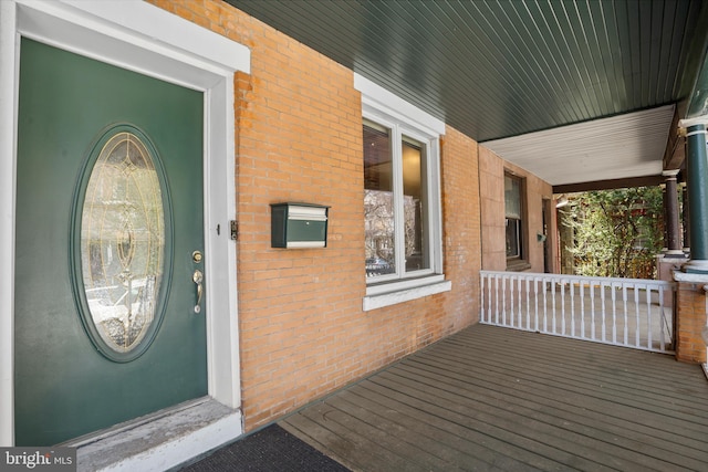 4830 Cedar Ave, Philadelphia, PA 19143 - doorway to property featuring brick siding