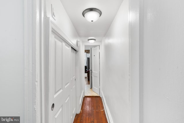 4830 Cedar Ave, Philadelphia, PA 19143 - corridor featuring dark wood-style flooring and baseboards