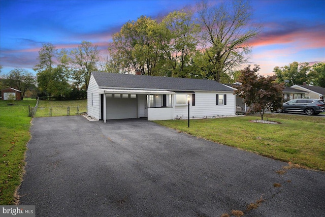 view of front of property with a lawn