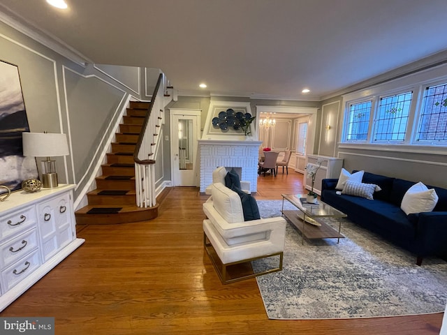 living room featuring crown molding and dark hardwood / wood-style floors