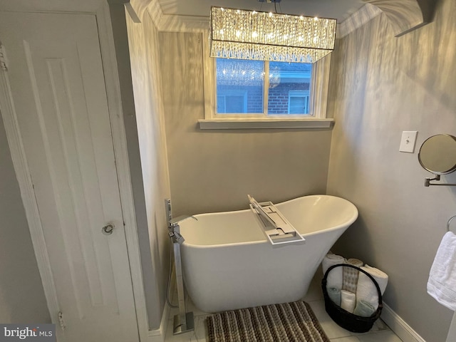 bathroom featuring tile patterned floors and a washtub