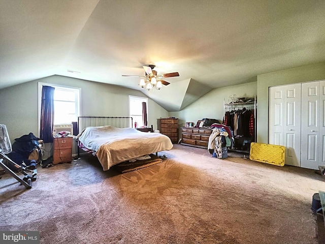 bedroom featuring carpet flooring, ceiling fan, and vaulted ceiling