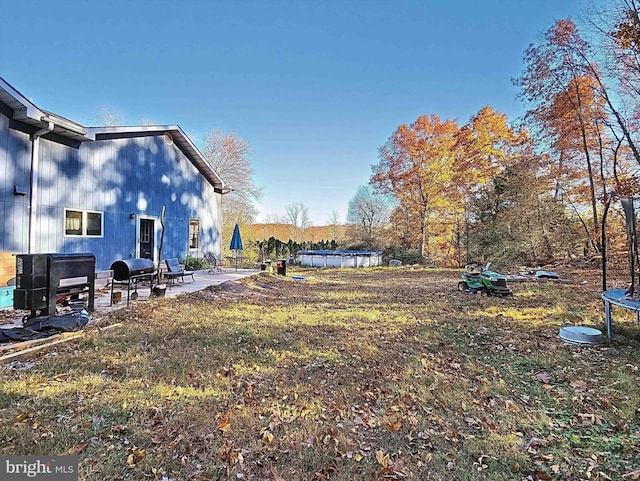 view of yard with a patio area