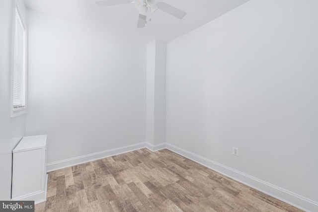 spare room with ceiling fan and light hardwood / wood-style flooring