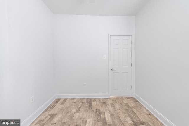 spare room featuring light wood-type flooring