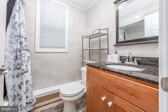 bathroom featuring a shower with curtain, vanity, crown molding, and toilet