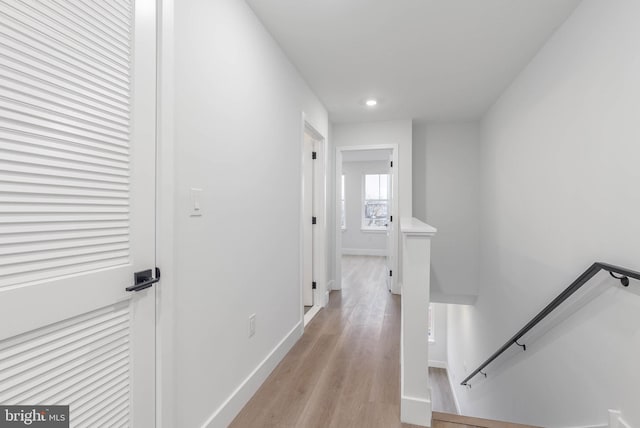 hallway featuring light wood-type flooring