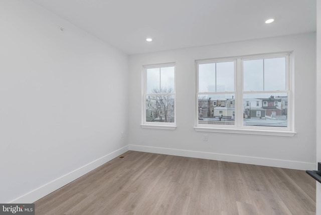 empty room featuring light wood-type flooring