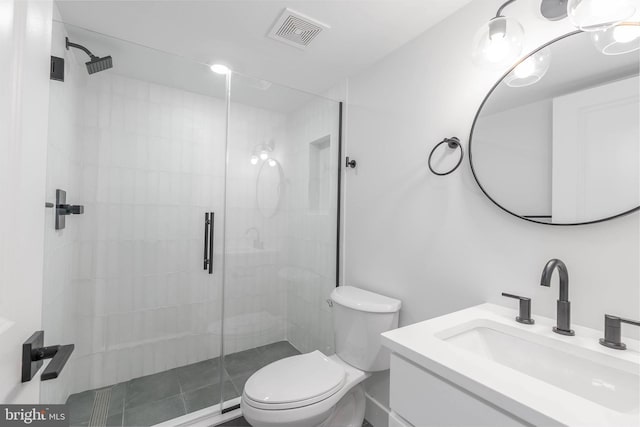 bathroom featuring walk in shower, vanity, and toilet