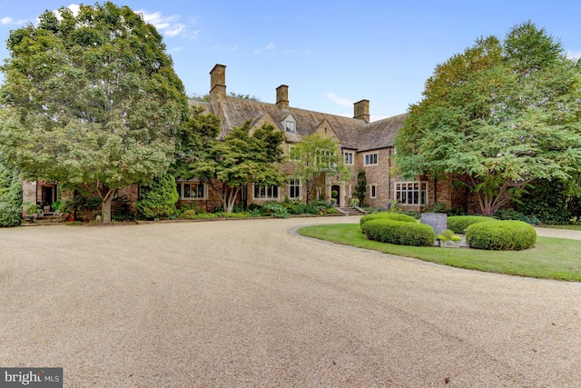 1601 Brintons Bridge Rd, Chadds Ford, PA 19317 - view of front facade with brick siding and a chimney