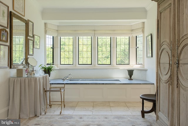 sunroom / solarium featuring plenty of natural light