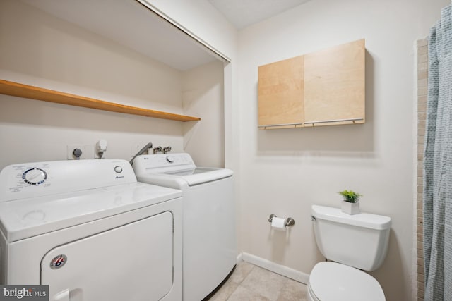 washroom featuring separate washer and dryer