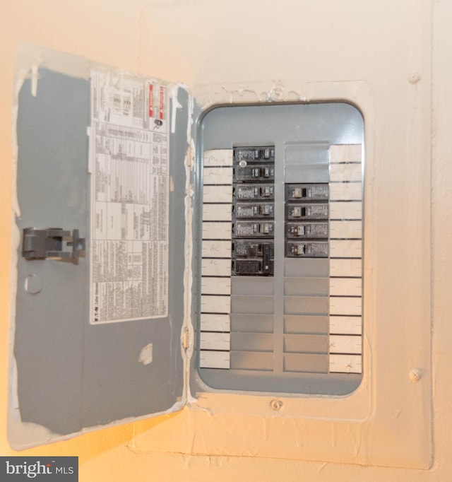 utility room featuring electric panel